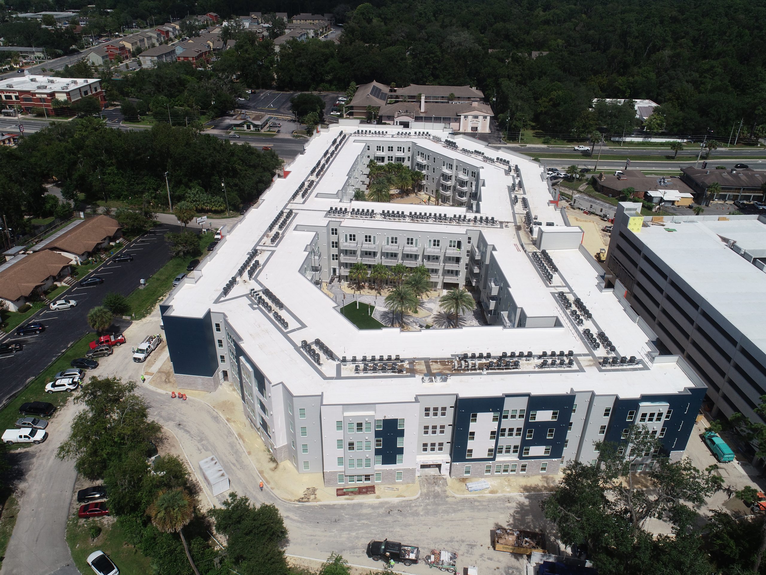 Aerial View of LIV+ Gainesville Apartments With Trees In The Center