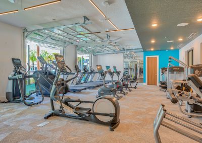 fully equipped fitness center at liv+ gainesville's student apartments