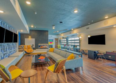 clubhouse lounge with amenities at liv+ gainesville